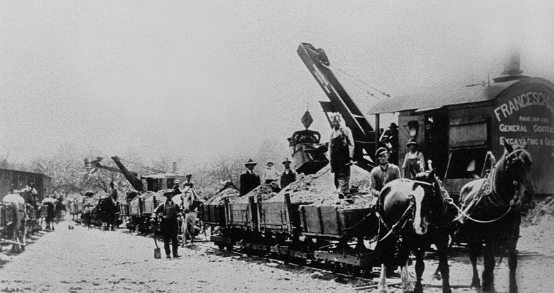Dufferin awarded first provincial highway project. Grading of the Rouge Hill portion of Kingston Road (Highway 2) in Toronto, Ontario. - 1917